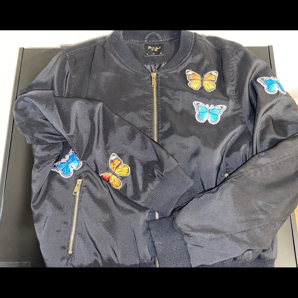 Like new butterfly jacket.
